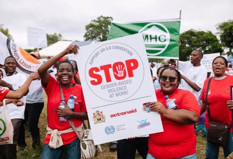 Women at a protest against violence and harassment in the workplace