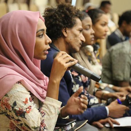 Young people in Sudan talking about their experience in practicing democracy and their role in the political transition at the Youth Open Dialogue